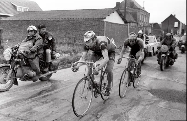 Racing cyclists attacking on a Belgian road